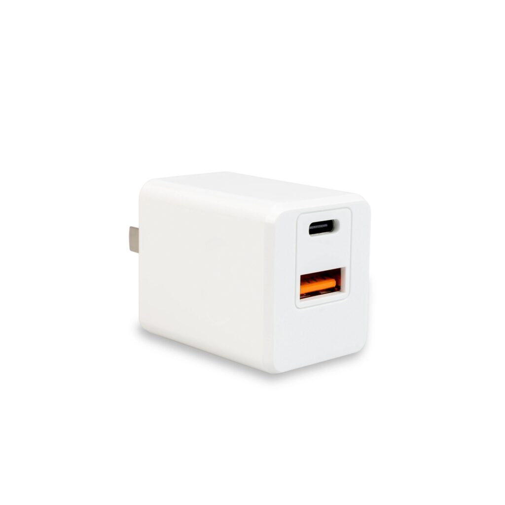 White USB‑C wall charger on white background (side view)