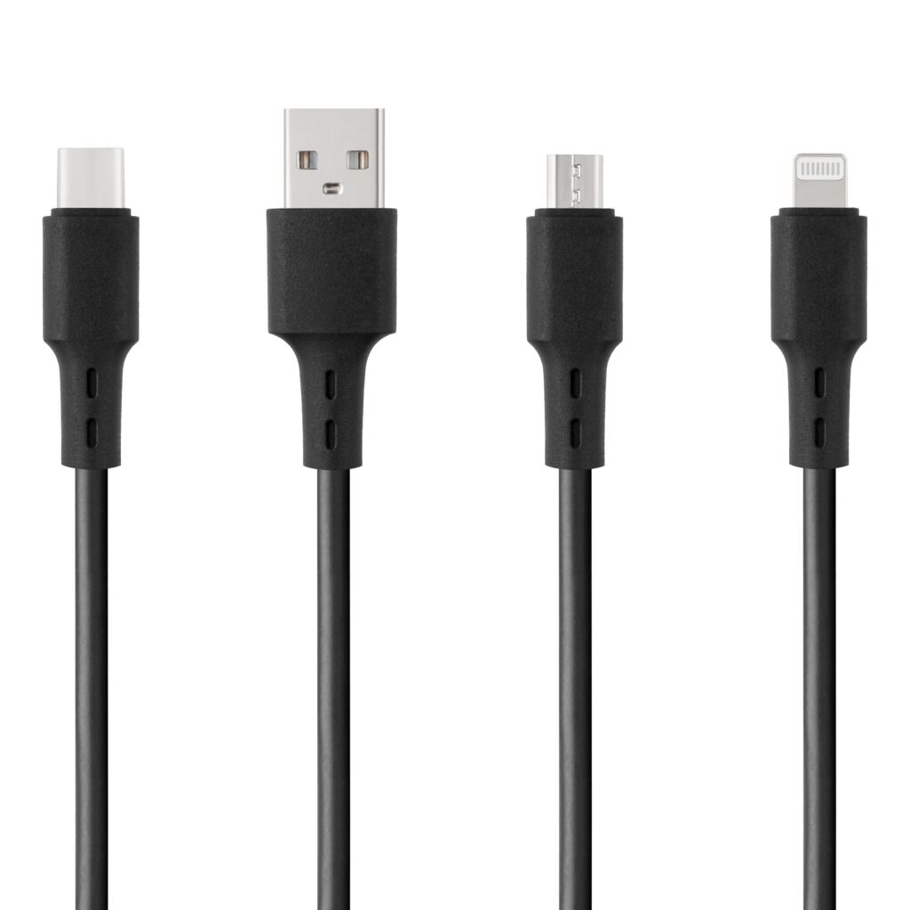 Universal laptop charger cable with multiple connector tips on white background